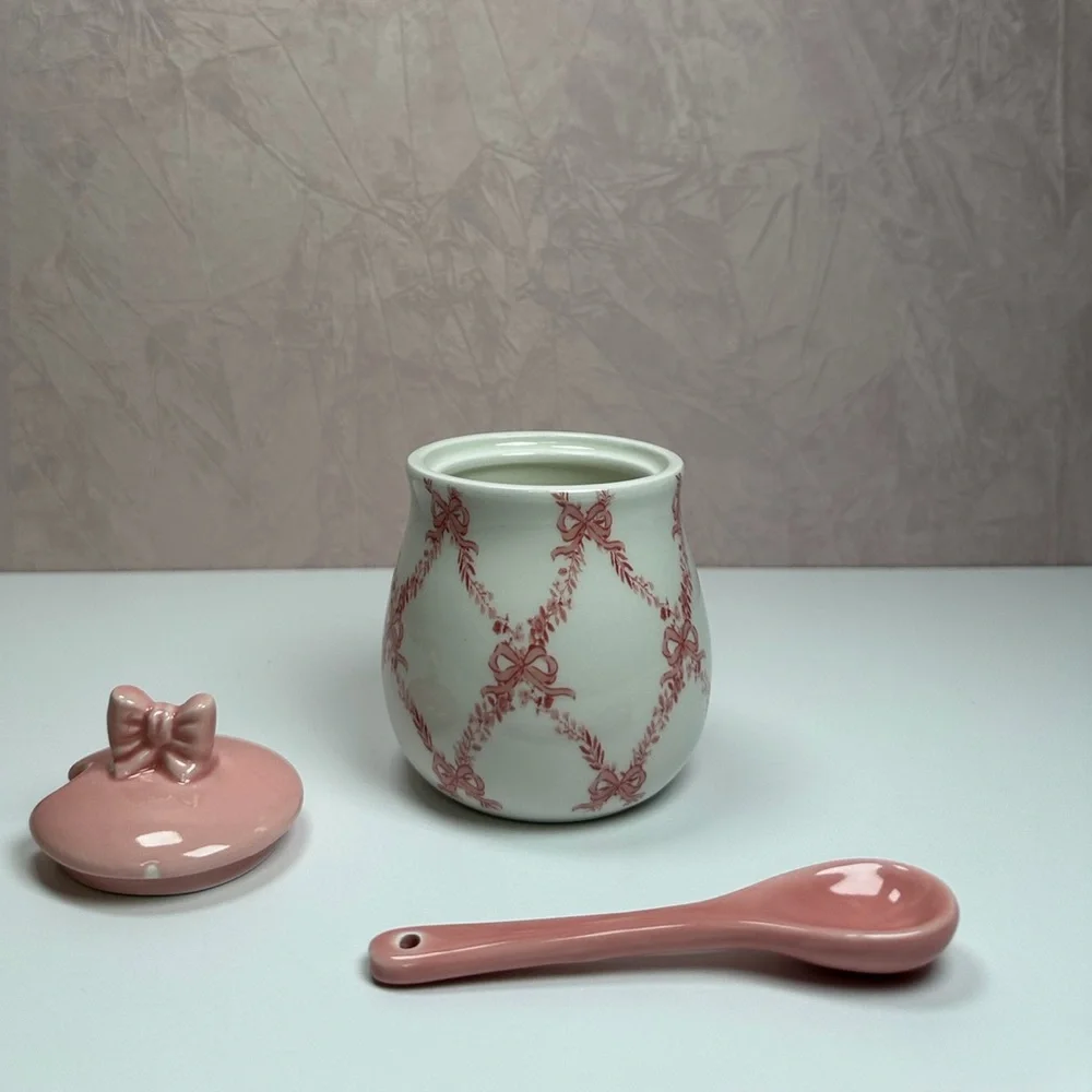 Elegant Pink and White Ceramic Sugar Bowl with Bow Accents